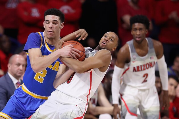 TUCSON, AZ - FEBRUARY 25:  Lonzo Ball #2 of the UCLA Bruins and Parker Jackson-Cartwright #0 of the Arizona Wildcats battle for possesion during the second half of the college basketball game at McKale Center on February 25, 2017 in Tucson, Arizona. The Bruins defeated the Wildcats 77-72.  (Photo by Christian Petersen/Getty Images)
