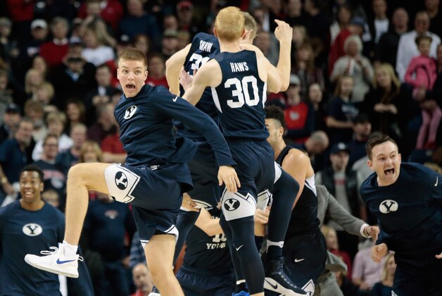 SPOKANE, WA - FEBRUARY 25:  The BYU Cougars celebrate their 79-71 victory over the Gonzaga Bulldogs at McCarthey Athletic Center on February 25, 2017 in Spokane, Washington.  (Photo by William Mancebo/Getty Images)
