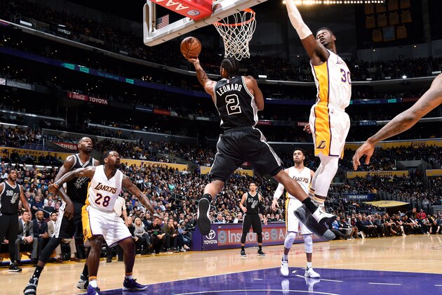LOS ANGELES, CA - FEBRUARY 26: Kawhi Leonard #2 of the San Antonio Spurs shoots a lay up during the game against the Los Angeles Lakers on February 26, 2017 at STAPLES Center in Los Angeles, California. NOTE TO USER: User expressly acknowledges and agrees that, by downloading and/or using this Photograph, user is consenting to the terms and conditions of the Getty Images License Agreement. Mandatory Copyright Notice: Copyright 2017 NBAE (Photo by Andrew D. Bernstein/NBAE via Getty Images)