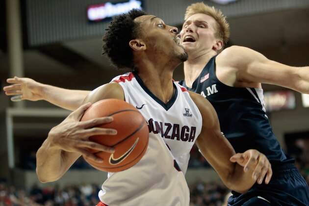 SPOKANE, WA - FEBRUARY 25:  Johnathan Williams #3 of the Gonzaga Bulldogs drives against Eric Mika #12 of the BYU Cougars in the second half at McCarthey Athletic Center on February 25, 2017 in Spokane, Washington.  BYU defeated Gonzaga 79-71.  (Photo by William Mancebo/Getty Images)