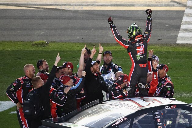 DAYTONA BEACH, FL - FEBRUARY 26:  (EDITORS NOTE: Retransmission with alternate crop.) Kurt Busch, driver of the #41 Haas Automation/Monster Energy Ford, celebrates with his crew after winning the 59th Annual DAYTONA 500 at Daytona International Speedway on February 26, 2017 in Daytona Beach, Florida.  (Photo by Chris Graythen/Getty Images)