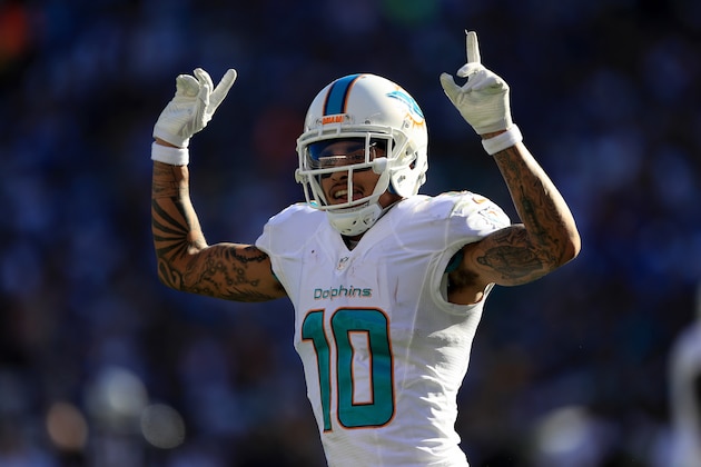 SAN DIEGO, CA - NOVEMBER 13:  Kenny Stills #10 of the Miami Dolphins reacts after scoring a touchdown during the first half of a game against the San Diego Chargers  at Qualcomm Stadium on November 13, 2016 in San Diego, California.  (Photo by Sean M. Haffey/Getty Images)