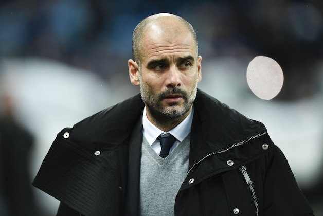 Manchester City's Spanish manager Pep Guardiola arrives for the UEFA Champions League Round of 16 first-leg football match between Manchester City and Monaco at the Etihad Stadium in Manchester, north west England on February 21, 2017. / AFP / Oli SCARFF        (Photo credit should read OLI SCARFF/AFP/Getty Images)