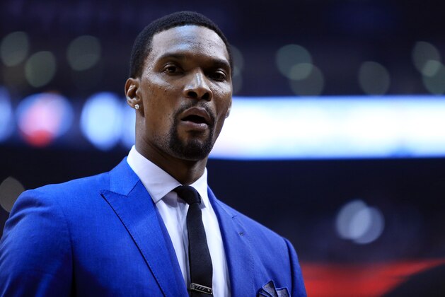 TORONTO, ON - MAY 03:  Chris Bosh #1 of the Miami Heat looks on from the bench in the first half of Game One of the Eastern Conference Semifinals against the Toronto Raptors during the 2016 NBA Playoffs at the Air Canada Centre on May 3, 2016 in Toronto, Ontario, Canada.  NOTE TO USER: User expressly acknowledges and agrees that, by downloading and or using this photograph, User is consenting to the terms and conditions of the Getty Images License Agreement.  (Photo by Vaughn Ridley/Getty Images)