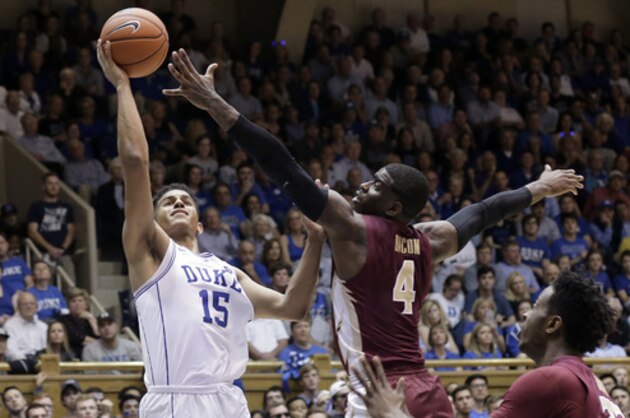 Duke's Frank Jackson (15) shoots while Florida State's Dwayne Bacon (4) defends during the second half of an NCAA college basketball game in Durham, N.C., Tuesday, Feb. 28, 2017. Duke won 75-70. (AP Photo/Gerry Broome)