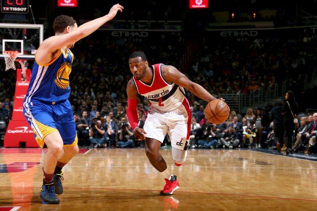 WASHINGTON, DC -  FEBRUARY 28:  John Wall #2 of the Washington Wizards handles the ball against the Golden State Warriors on February 28, 2017 at Verizon Center in Washington, DC. NOTE TO USER: User expressly acknowledges and agrees that, by downloading and or using this Photograph, user is consenting to the terms and conditions of the Getty Images License Agreement. Mandatory Copyright Notice: Copyright 2017 NBAE (Photo by Ned Dishman/NBAE via Getty Images)