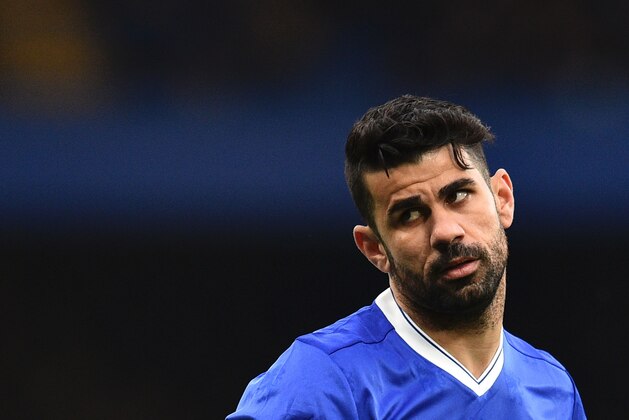 Chelsea's Brazilian-born Spanish striker Diego Costa gestures during the English Premier League football match between Chelsea and Swansea at Stamford Bridge in London on February 25, 2017. / AFP / Glyn KIRK / RESTRICTED TO EDITORIAL USE. No use with unauthorized audio, video, data, fixture lists, club/league logos or 'live' services. Online in-match use limited to 75 images, no video emulation. No use in betting, games or single club/league/player publications.  /         (Photo credit should read GLYN KIRK/AFP/Getty Images)