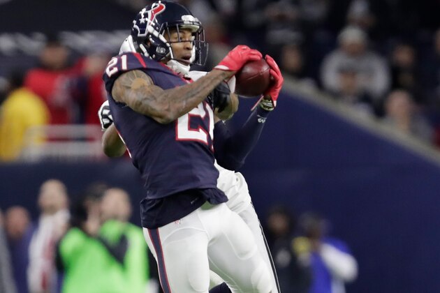 HOUSTON, TX - JANUARY 07:  A.J. Bouye #21 of the Houston Texans intercepts a pass from Connor Cook #8 of the Oakland Raiders during the second half of their AFC Wild Card game at NRG Stadium on January 7, 2017 in Houston, Texas.  (Photo by Tim Warner/Getty Images)