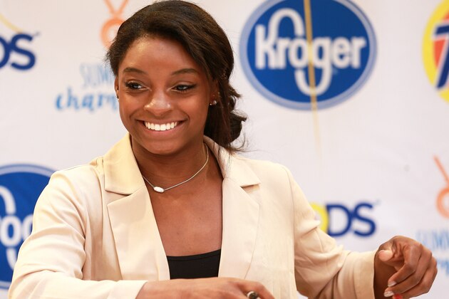 HOUSTON, TX - SEPTEMBER 30:  Olympic gold medal-winning gymnast Simone Biles meets with fans in her home town at Kroger on September 30, 2016 in Houston, Texas.  (Photo by Bob Levey/Getty Images)