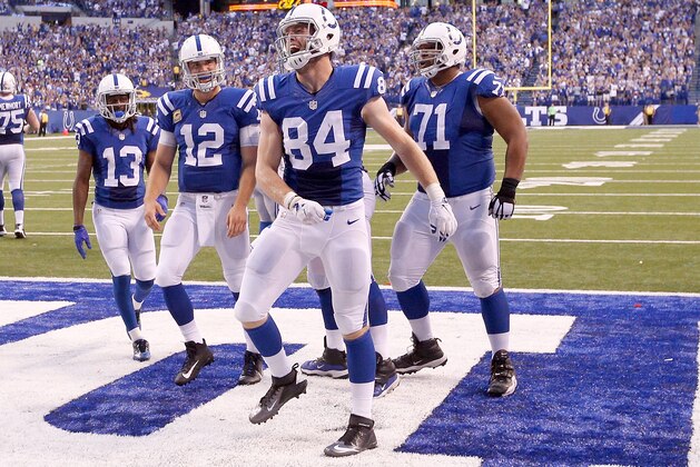 INDIANAPOLIS, IN - SEPTEMBER 11: Jack Doyle #84 of the Indianapolis Colts celebrates with teammates after scoring a touchdown in the fourth quarter of the game against the Detroit Lions  at Lucas Oil Stadium on September 11, 2016 in Indianapolis, Indiana. (Photo by Joe Robbins/Getty Images)