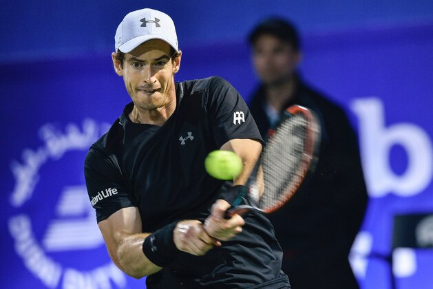 Britain's Andy Murray, world number one, returns the ball to Guillermo Garcia-Lopez of Spain during their ATP Dubai Duty Free Tennis Championship match in Dubai, on March 1, 2017. / AFP PHOTO / STRINGER        (Photo credit should read STRINGER/AFP/Getty Images)