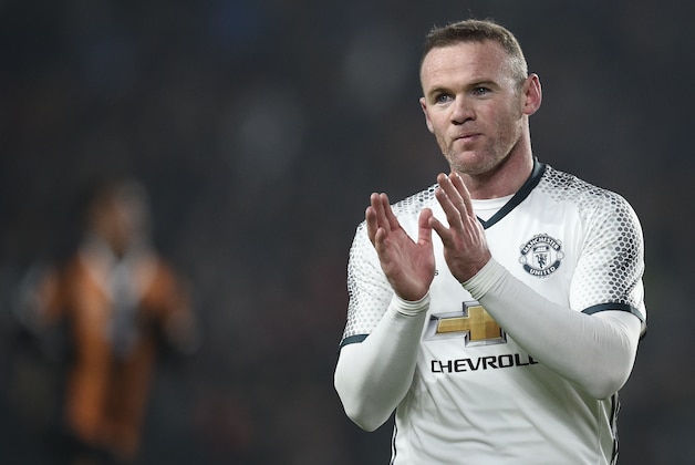 Manchester United's English striker Wayne Rooney claps after winning the EFL (English Football League) Cup semi-final second-leg football match between Hull City and Manchester United at the KCOM Stadium in Kingston upon Hull, north east England on January 26, 2017.
  / AFP / Oli SCARFF / RESTRICTED TO EDITORIAL USE. No use with unauthorized audio, video, data, fixture lists, club/league logos or 'live' services. Online in-match use limited to 75 images, no video emulation. No use in betting, games or single club/league/player publications.  /         (Photo credit should read OLI SCARFF/AFP/Getty Images)