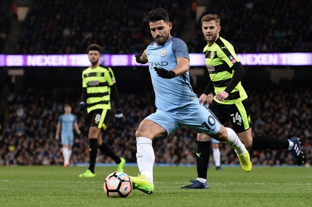 Manchester City's Argentinian striker Sergio Aguero shoots buts fails to score during the FA Cup fourth round replay football match between Manchester City and Huddersfield Town at the Etihad Stadium in Manchester, north west England, on March 1, 2017. / AFP PHOTO / Oli SCARFF / RESTRICTED TO EDITORIAL USE. No use with unauthorized audio, video, data, fixture lists, club/league logos or 'live' services. Online in-match use limited to 75 images, no video emulation. No use in betting, games or single club/league/player publications.  /         (Photo credit should read OLI SCARFF/AFP/Getty Images)