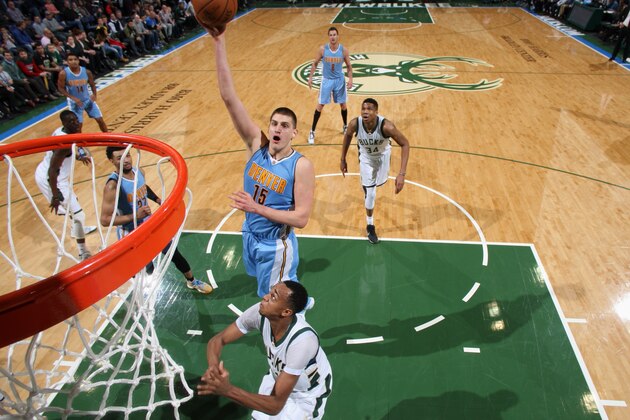 Milwaukee, WI - MARCH 1: Nikola Jokic #15 of the Denver Nuggets shoots the ball against the Milwaukee Bucks on March 1, 2017 at the BMO Harris Bradley Center in Milwaukee, Wisconsin. NOTE TO USER: User expressly acknowledges and agrees that, by downloading and or using this Photograph, user is consenting to the terms and conditions of the Getty Images License Agreement. Mandatory Copyright Notice: Copyright 2017 NBAE (Photo by Gary Dineen/NBAE via Getty Images) Milwaukee, WI - MARCH 1: Nikola Jokic #15 of the Denver Nuggets shoots the ball against the Milwaukee Bucks on March 1, 2017 at the BMO Harris Bradley Center in Milwaukee, Wisconsin. NOTE TO USER: User expressly acknowledges and agrees that, by downloading and or using this Photograph, user is consenting to the terms and conditions of the Getty Images License Agreement. Mandatory Copyright Notice: Copyright 2017 NBAE (Photo by Gary Dineen/NBAE via Getty Images)