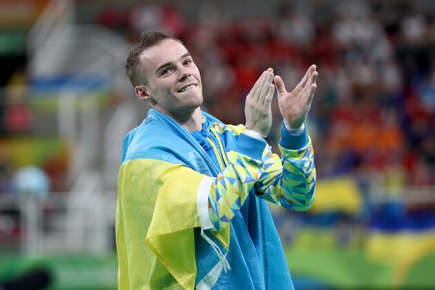 RIO DE JANEIRO, BRAZIL - AUGUST 16:  Oleg Verniaiev of Ukraine celebrates winning the gold medal in the Parallel Bars Final on Day 11 of the Rio 2016 Olympic Games at the Rio Olympic Arena on August 16, 2016 in Rio de Janeiro, Brazil.  (Photo by Julian Finney/Getty Images)
