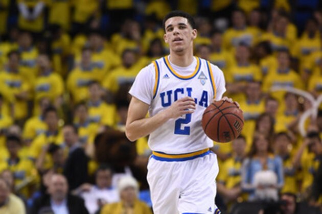 UCLA guard Lonzo Ball dribbles the ball during the second half of an NCAA college basketball game against Washington, Wednesday, March 1, 2017, in Los Angeles. UCLA won 98-66. (AP Photo/Mark J. Terrill)