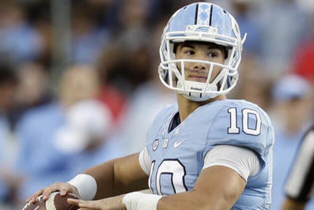 FILE - In this Nov. 19, 2016, file photo, North Carolina quarterback Mitch Trubisky (10) looks to pass against The Citadel during the first half of an NCAA college football game in Chapel Hill, N.C. Trubisky said Monday, Jan. 9, 2017, that he plans to skip his senior season and enter the NFL draft. (AP Photo/Gerry Broome, File) FILE - In this Nov. 19, 2016, file photo, North Carolina quarterback Mitch Trubisky (10) looks to pass against The Citadel during the first half of an NCAA college football game in Chapel Hill, N.C. Trubisky said Monday, Jan. 9, 2017, that he plans to skip his senior season and enter the NFL draft. (AP Photo/Gerry Broome, File)
