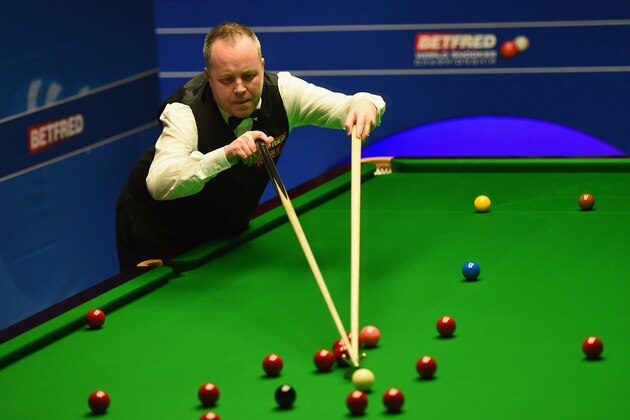 SHEFFIELD, ENGLAND - APRIL 26:  John Higgins of Scotland in action during his quarter final match against Alan McManus of Scotland on day eleven of the World Championship Snooker at Crucible Theatre on April 26, 2016 in Sheffield, England.  (Photo by Laurence Griffiths/Getty Images)