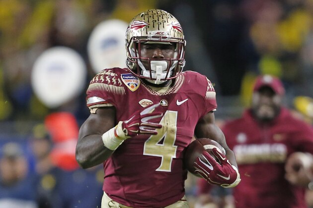 MIAMI GARDENS, FL - DECEMBER 30: Dalvin Cook #4 of the Florida State Seminoles runs for 71 yards against the Michigan Wolverines during during fourth quarter action at the 2016 Capital One Orange Bowl at Hard Rock Stadium on December 30, 2016 in Miami Gardens, Florida. Florida State defeated Michigan 33-32. (Photo by Joel Auerbach/Getty Images)