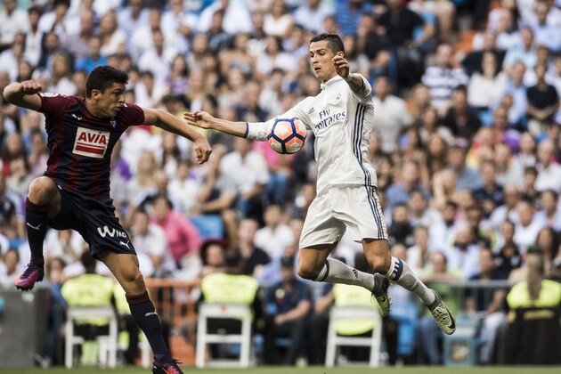 MADRID, SPAIN - OCTOBER 02: Cristiano Ronaldo of Real Madrid in action during their La Liga match between Real Madrid CF and SD Eibar at the Santiago BernabÃ©u Stadium on 02 October 2016 in Madrid, Spain. (Photo by Power Sport Images/Getty Images)
