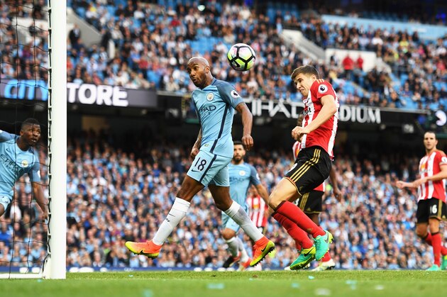MANCHESTER, ENGLAND - AUGUST 13: Paddy McNair of Sunderland scores a own goal for Manchester City's second goal during the Premier League match between Manchester City and Sunderland at Etihad Stadium on August 13, 2016 in Manchester, England.  (Photo by Stu Forster/Getty Images)
