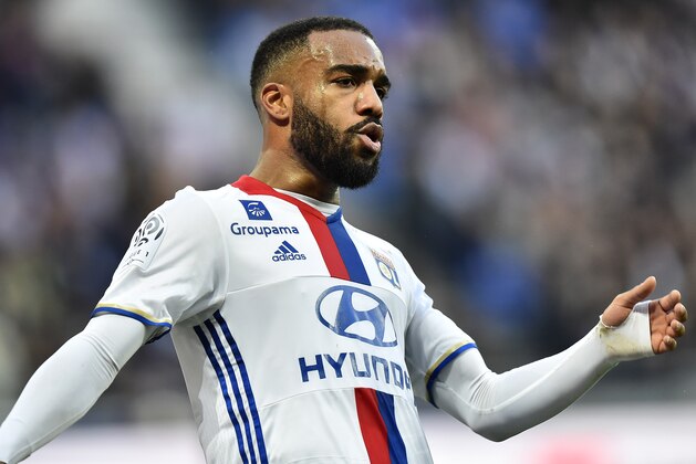 Lyon's French forward Alexandre Lacazette gestures during the French L1 football match between Olympique Lyonnais (OL) and Dijon (DFCO) on February 19, 2017, at the Parc Olympique Lyonnais stadium in Decines-Charpieu near Lyon, central-eastern France.  / AFP / ROMAIN LAFABREGUE        (Photo credit should read ROMAIN LAFABREGUE/AFP/Getty Images)