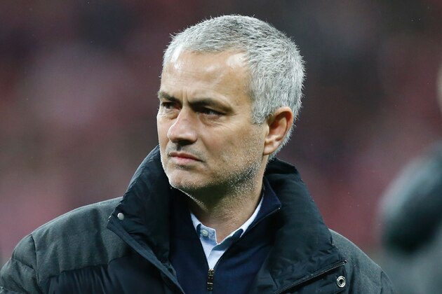 Manchester United's Portuguese manager Jose Mourinho watches the celebrations on the pitch after their victory in the English League Cup final football match between Manchester United and Southampton at Wembley stadium in north London on February 26, 2017.
Zlatan Ibrahimovic sealed the first major silverware of Jose Mourinho's Manchester United reign and broke Southampton's hearts as the Swedish star's late goal clinched a dramatic 3-2 victory in Sunday's League Cup final. / AFP / Ian KINGTON / RESTRICTED TO EDITORIAL USE. No use with unauthorized audio, video, data, fixture lists, club/league logos or 'live' services. Online in-match use limited to 75 images, no video emulation. No use in betting, games or single club/league/player publications.  /         (Photo credit should read IAN KINGTON/AFP/Getty Images)