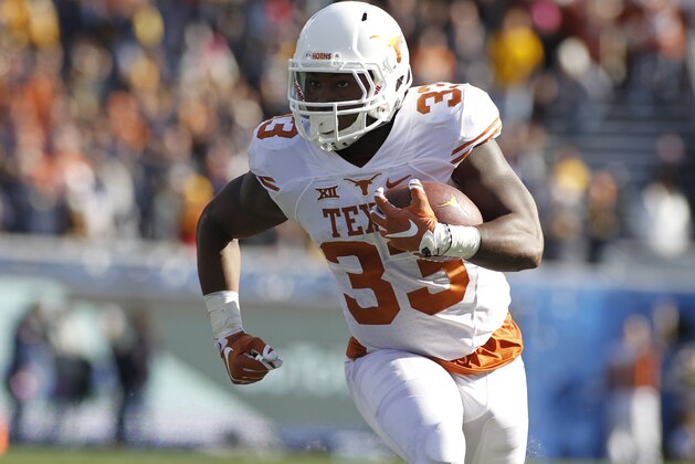 MORGANTOWN, WV - NOVEMBER 14:  D'Onta Foreman #33 of the Texas Longhorns in action during the game against the West Virginia Mountaineers on November 14, 2015 at Mountaineer Field in Morgantown, West Virginia.  (Photo by Justin K. Aller/Getty Images)