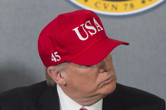 US President Donald Trump attends an operations briefing at the pre-commissioned USS Gerald R. Ford aircraft carrier in Newport News, Virginia, March 2, 2017. / AFP PHOTO / SAUL LOEB        (Photo credit should read SAUL LOEB/AFP/Getty Images)