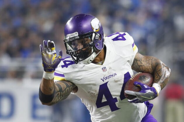 Minnesota Vikings running back Matt Asiata (44) runs against the Detroit Lions during an NFL football game in Detroit, Thursday, Nov. 24, 2016. (AP Photo/Paul Sancya)