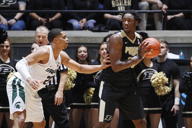 WEST LAFAYETTE, IN - FEBRUARY 18: Caleb Swanigan #50 of the Purdue Boilermakers looks to the basket against Miles Bridges #22 of the Michigan State Spartans during the game at Mackey Arena on February 18, 2017 in West Lafayette, Indiana. Purdue defeated Michigan State 80-63. (Photo by Joe Robbins/Getty Images)