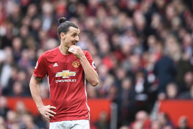 Manchester United's Swedish striker Zlatan Ibrahimovic gestures during the English Premier League football match between Manchester United and Bournemouth at Old Trafford in Manchester, north west England, on March 4, 2017. / AFP PHOTO / Oli SCARFF / RESTRICTED TO EDITORIAL USE. No use with unauthorized audio, video, data, fixture lists, club/league logos or 'live' services. Online in-match use limited to 75 images, no video emulation. No use in betting, games or single club/league/player publications.  /         (Photo credit should read OLI SCARFF/AFP/Getty Images)
