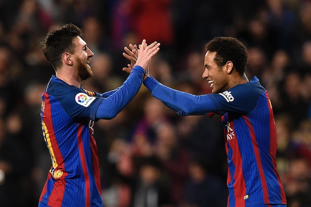 Barcelona's Argentinian forward Lionel Messi (L) celebrates with Barcelona's Brazilian forward Neymar (R) after scoring a goal during the Spanish league football match FC Barcelona vs RC Celta de Vigo at the Camp Nou stadium in Barcelona on March 4, 2017. / AFP PHOTO / LLUIS GENE        (Photo credit should read LLUIS GENE/AFP/Getty Images)