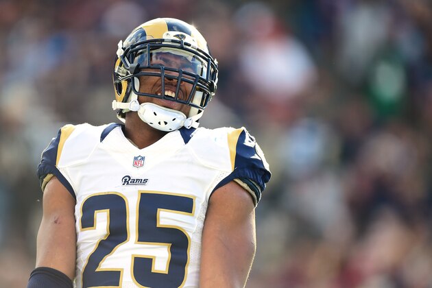 LOS ANGELES, CA - JANUARY 01:  T.J. McDonald #25 of the Los Angeles Rams reacts to an interception chance during the game against the Arizona Cardinals at Los Angeles Memorial Coliseum on January 1, 2017 in Los Angeles, California.  (Photo by Harry How/Getty Images)