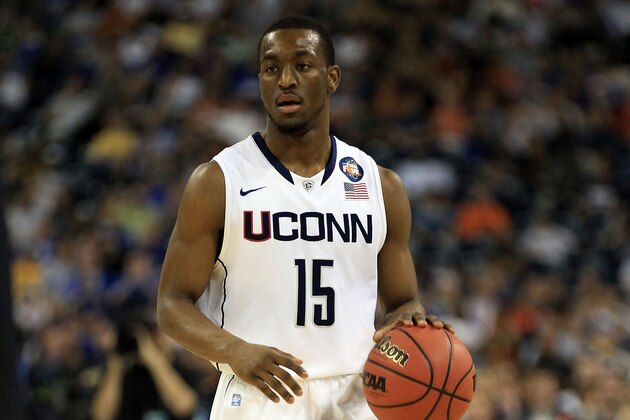 HOUSTON, TX - APRIL 02:  Kemba Walker #15 of the Connecticut Huskies handles the ball against the Kentucky Wildcats during the National Semifinal game of the 2011 NCAA Division I Men's Basketball Championship at Reliant Stadium on April 2, 2011 in Houston, Texas.  (Photo by Streeter Lecka/Getty Images)