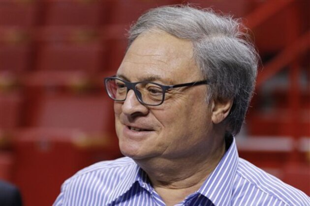 Miami Marlins owner Jeffrey Loria stands beside the court before the Miami Heat played against the Oklahoma City Thunder in an NBA basketball game, Thursday, Dec. 3, 2015, in Miami. (AP Photo/Joe Skipper)
