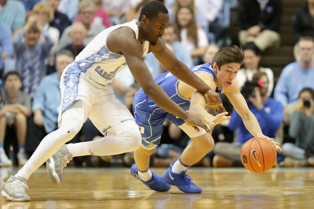 CHAPEL HILL, NC - MARCH 04: Theo Pinson #1 of the North Carolina Tar Heels goes after a loose ball against Grayson Allen #3 of the Duke Blue Devils during their game at the Dean Smith Center on March 4, 2017 in Chapel Hill, North Carolina. (Photo by Streeter Lecka/Getty Images) CHAPEL HILL, NC - MARCH 04: Theo Pinson #1 of the North Carolina Tar Heels goes after a loose ball against Grayson Allen #3 of the Duke Blue Devils during their game at the Dean Smith Center on March 4, 2017 in Chapel Hill, North Carolina. (Photo by Streeter Lecka/Getty Images)