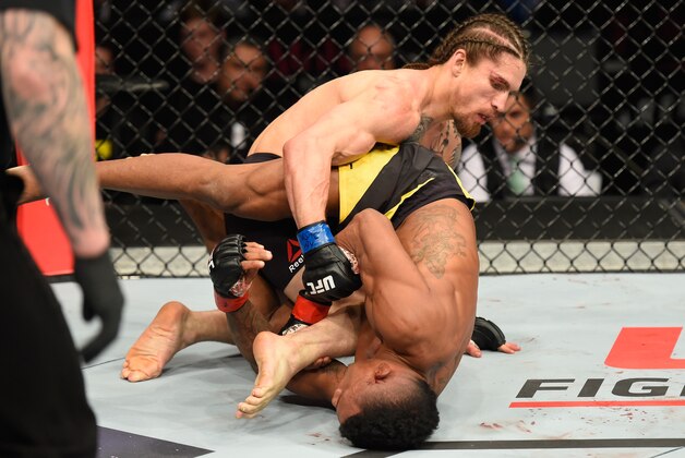 LAS VEGAS, NV - MARCH 04: Iuri Alcantara of Brazil (bottom) grapples with Luke Sanders in their bantamweight bout during the UFC 209 event at T-Mobile Arena on March 4, 2017 in Las Vegas, Nevada.  (Photo by Josh Hedges/Zuffa LLC/Zuffa LLC via Getty Images)