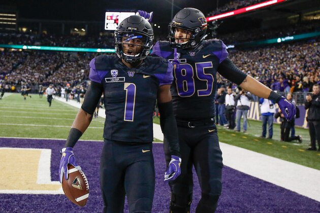 SEATTLE, WA - NOVEMBER 12:  Wide receiver John Ross #1 of the Washington Huskies is congratulated by tight end David Ajamu #85 after scoring a touchdown against the USC Trojans on November 12, 2016 at Husky Stadium in Seattle, Washington. The Trojans defeated the Huskies 24-13.  (Photo by Otto Greule Jr/Getty Images)