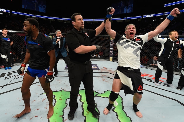 LAS VEGAS, NV - MARCH 04: Daniel Kelly of Australia (right) reacts to his victory over Rashad Evans (left) in their middleweight bout during the UFC 209 event at T-Mobile Arena on March 4, 2017 in Las Vegas, Nevada.  (Photo by Josh Hedges/Zuffa LLC/Zuffa LLC via Getty Images)