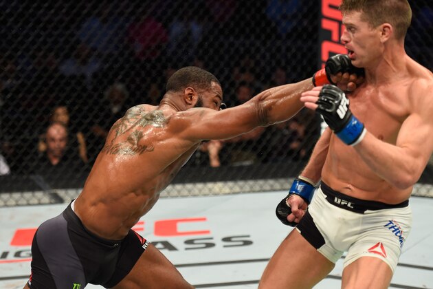 LAS VEGAS, NV - MARCH 04: (L-R) Tyron Woodley punches Stephen Thompson in their UFC welterweight championship bout during the UFC 209 event at T-Mobile Arena on March 4, 2017 in Las Vegas, Nevada.  (Photo by Josh Hedges/Zuffa LLC/Zuffa LLC via Getty Images)