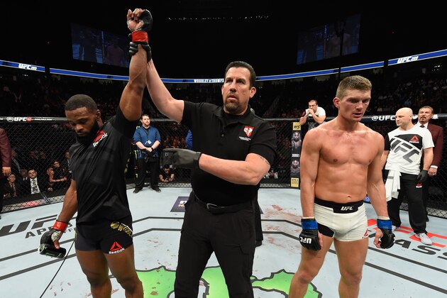 LAS VEGAS, NV - MARCH 04: Tyron Woodley (left) reacts to his victory over Stephen Thompson (right) in their UFC welterweight championship bout during the UFC 209 event at T-Mobile Arena on March 4, 2017 in Las Vegas, Nevada.  (Photo by Josh Hedges/Zuffa LLC/Zuffa LLC via Getty Images)