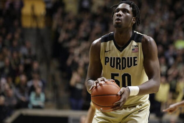 Purdue forward Caleb Swanigan (50) shoots a free throw against Rutgers in the second half of an NCAA college basketball game in West Lafayette, Ind., Tuesday, Feb. 14, 2017. Purdue defeated Rutgers 74-55. (AP Photo/Michael Conroy)
