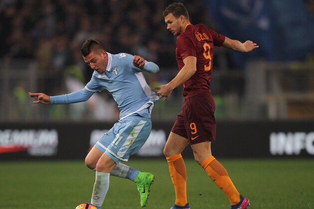ROME, ITALY - MARCH 01:  Sergej Milinkovic (L) of SS Lazio competes for the ball with Edin Dzeko of AS Roma during the TIM Cup match between SS Lazio and AS Roma at Olimpico Stadium on March 1, 2017 in Rome, Italy.  (Photo by Paolo Bruno/Getty Images)