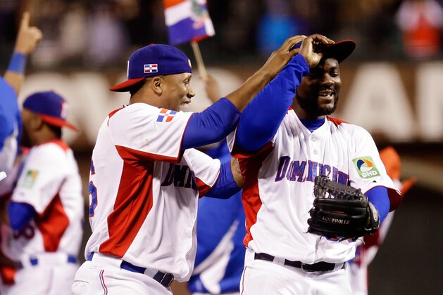 SAN FRANCISCO, CA - MARCH 19:  Pedro Strop #46 and Fernando Rodney #56 of the Dominican Republic celerbate after defeating Puerto Rico to win the Championship Round of the 2013 World Baseball Classic by a score of 3-0 at AT&T Park on March 19, 2013 in San Francisco, California.  (Photo by Ezra Shaw/Getty Images)