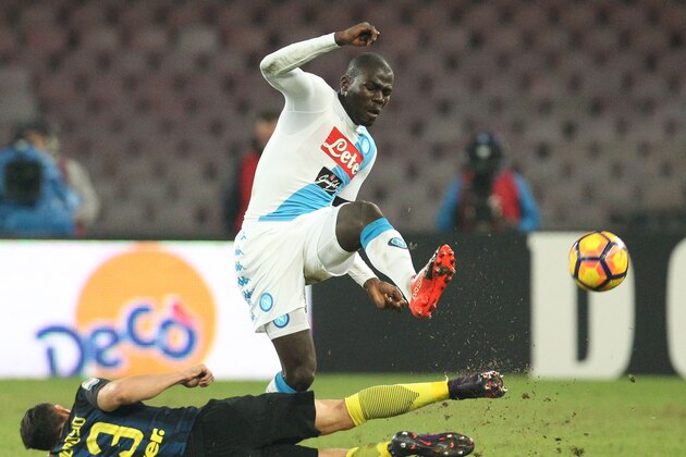 Napoli's defender from France Kalidou Koulibaly fights for the ball with Inter Milan's defender from Italy Danilo D'Ambrosio during the Italian Serie A football match SSC Napoli vs Inter Milan on December 2, 2016 at the San Paolo Stadium. / AFP / CARLO HERMANN        (Photo credit should read CARLO HERMANN/AFP/Getty Images)