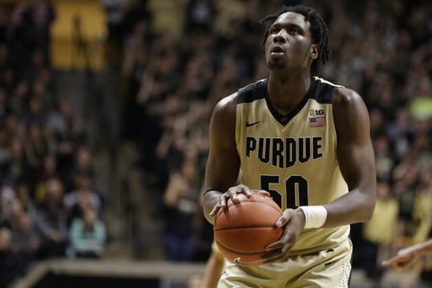 Purdue forward Caleb Swanigan (50) shoots a free throw against Rutgers in the second half of an NCAA college basketball game in West Lafayette, Ind., Tuesday, Feb. 14, 2017. Purdue defeated Rutgers 74-55. (AP Photo/Michael Conroy)