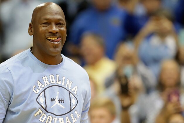 CHAPEL HILL, NC - MARCH 04:  Michael Jordan speaks to the crowd at halftime during their game against the Duke Blue Devils at the Dean Smith Center on March 4, 2017 in Chapel Hill, North Carolina.  (Photo by Streeter Lecka/Getty Images)