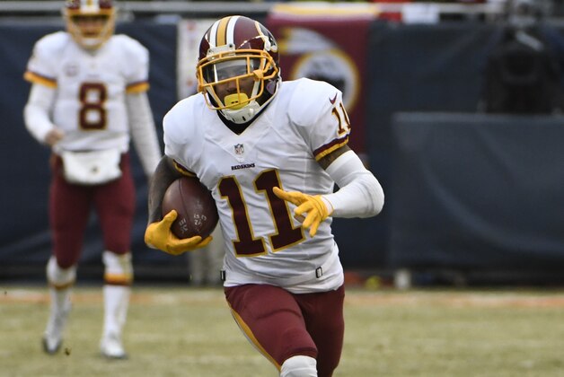 DeSean Jackson #11 of the Washington Redskins catches a pass and runs against the Chicago Bears during the first quarter at Soldier Field on December 24, 2016 in Chicago, Illinois. (Photo by David Banks/Getty Images)