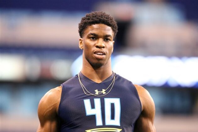 Connecticut safety Obi Melifonwu is seen after the broad jump at the 2017 NFL football scouting combine Monday, March 6, 2017, in Indianapolis. (AP Photo/Gregory Payan)